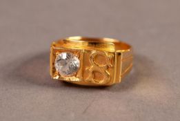 SIGNET RING, the oblong top embossed with letter 'S' next to a solitaire white stone in a square
