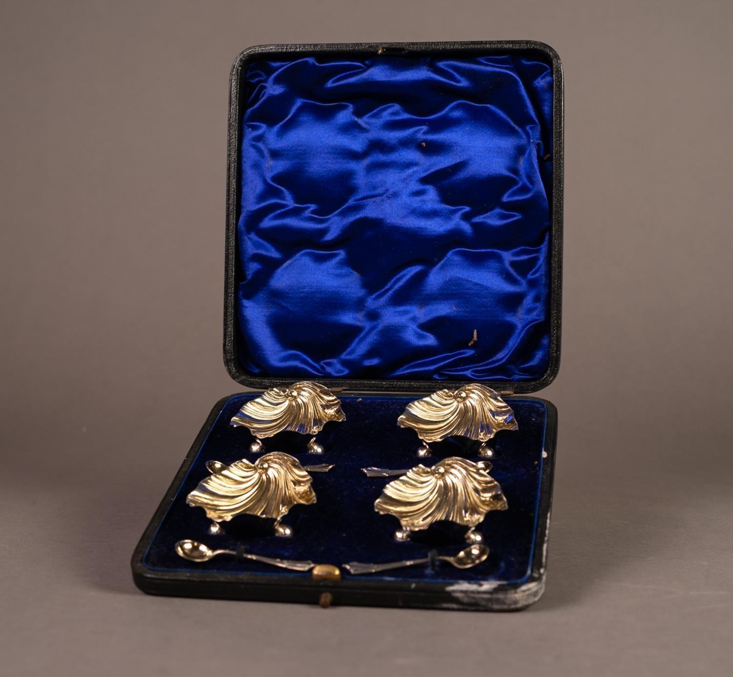 LATE VICTORIAN CASED SET OF FOUR SILVER GILT OPEN SALTS AND SPOONS BY WILLIAM HUTTON & SONS Ltd,