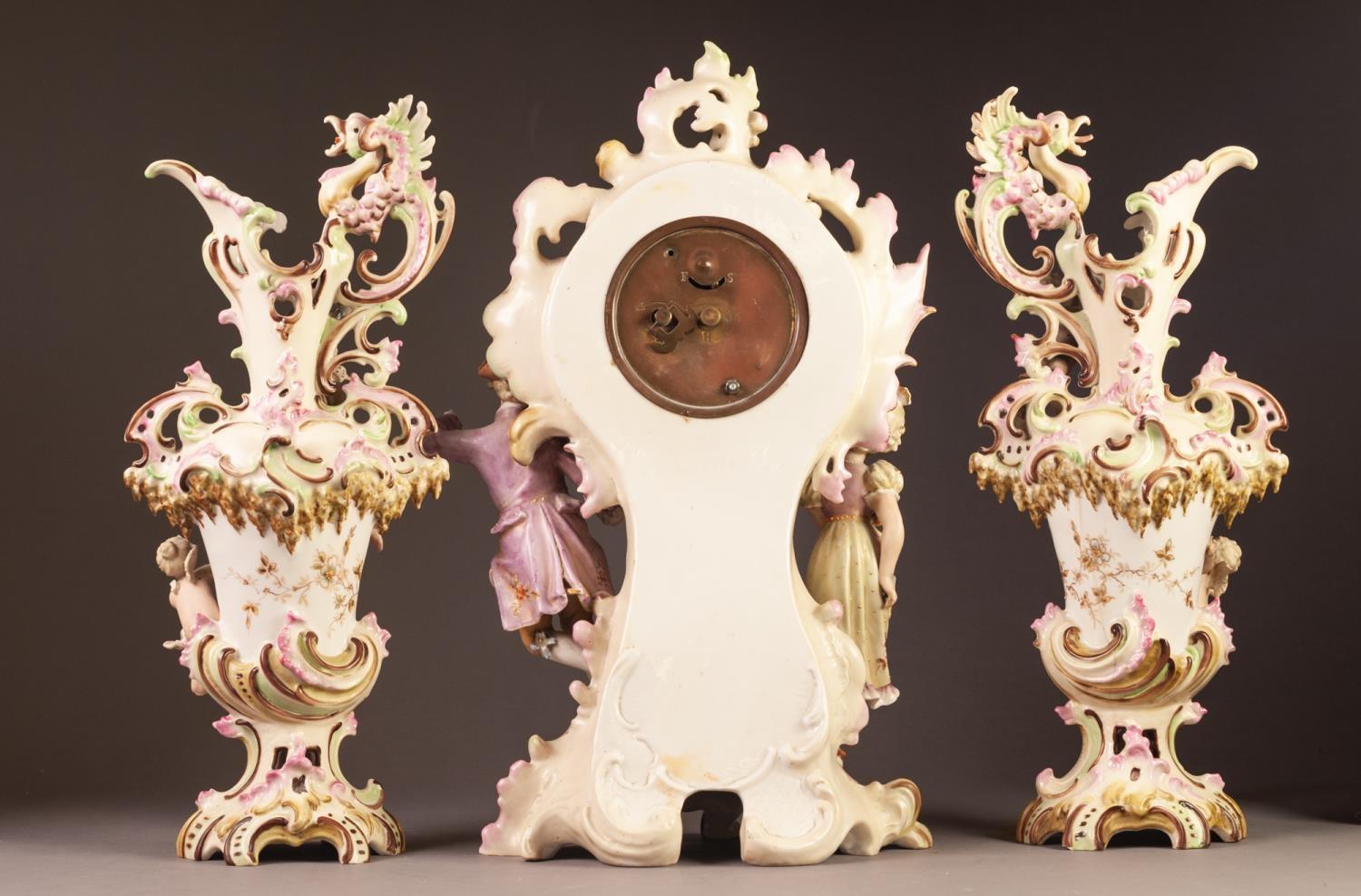 A CIRCA 1900 GERMAN PORCELAIN ROCOCO REVIVAL THREE PIECE CLOCK GARNITURE,  each of scrolliated - Image 2 of 3