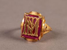 SIGNET RING, the top set with a rectangular red stone with overlaid monogram, 6.8gms, ring size M/N,