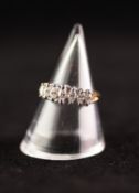 14k YELLOW AND WHITE GOLD DIAMOND SET RING, claw set with seven graduated marquise cut stones, 2.