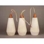 STYLISH SET OF THREE 1960?s/ 1970?s FROSTED GLASS PENDANT CEILING LIGHT FITTINGS, each of slender,