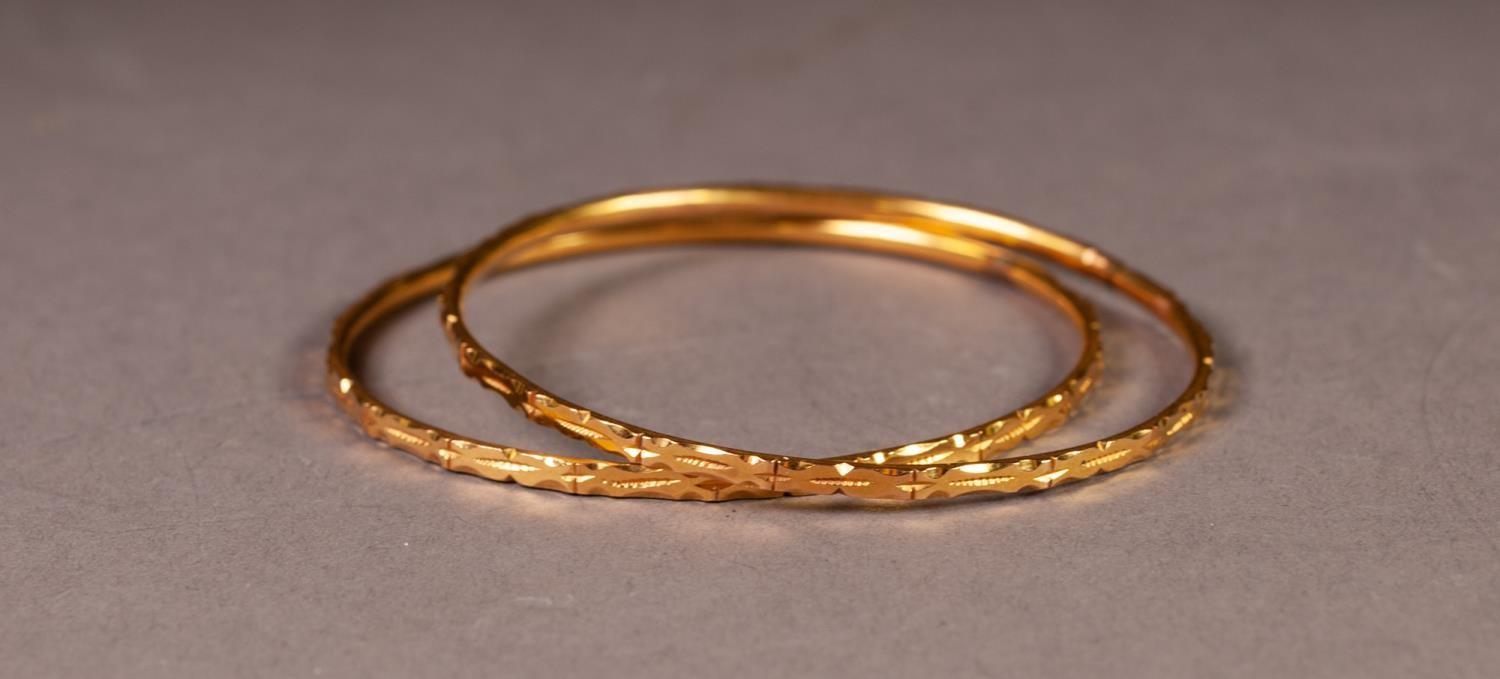PAIR OF THIN BANGLES with chased decoration, 2 1/4" (5.7cm) diameter, 22.9gms - Image 2 of 3