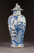 NINETEENTH CENTURY CHINESE BLUE AND WHITE PORCELAIN VASE AND COVER, of baluster form with dog of