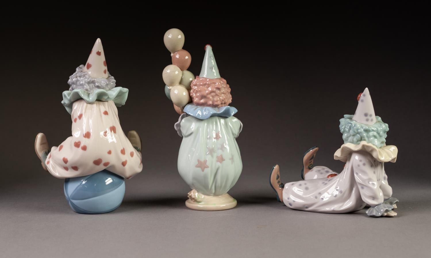 THREE LLADRO PORCELAIN FIGURES OF CLOWNS, one modelled lying down, another standing, holding - Image 2 of 3