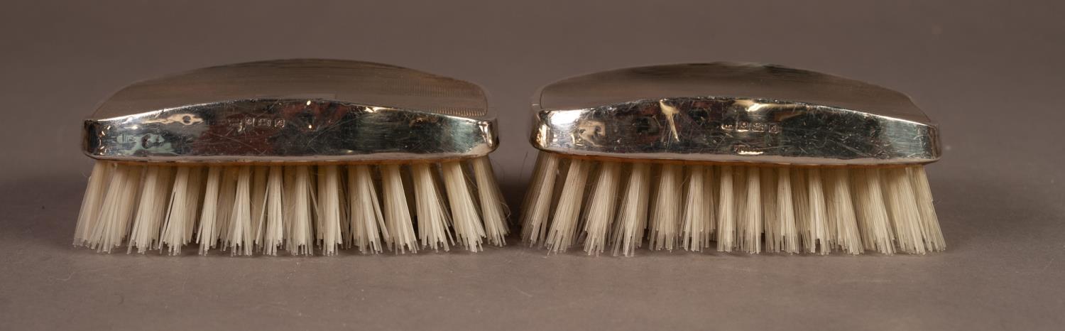 BOXED PAIR OF ENGINE TURNED FILLED SILVER BACKED MILITARY HAIR BRUSHES, Birmingham 1975 - Image 2 of 3