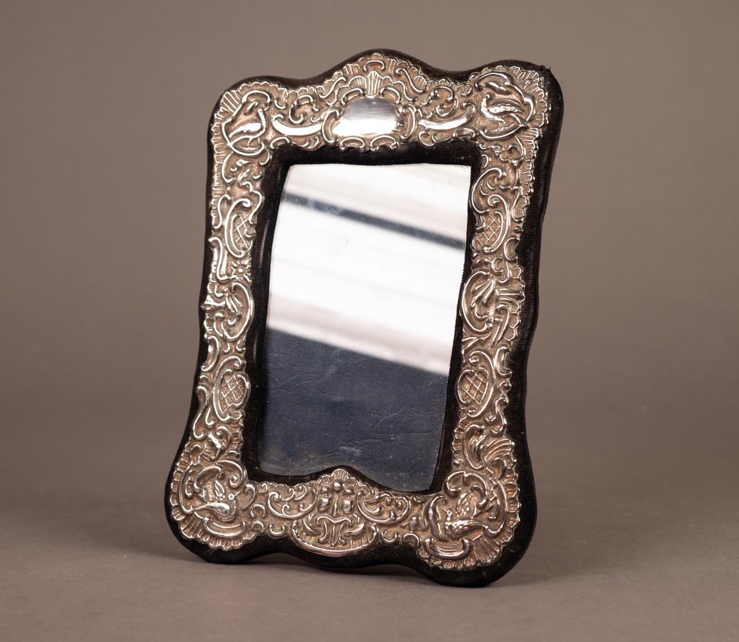 SILVER FRONTED DESK TOP PHOTOGRAPH FRAME, in blue plush with shaped outline and easel support,