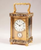 EARLY TWENTIETH CENTURY FRENCH PASTE SET BRASS CARRIAGE CLOCK WITH ALARM, retailed by Finnigan?s