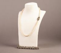 SINGLE STRAND NECKLACE OF GRADUATED CULTURED PEARLS with silver and marcasite clasp, 16" (40.6cm)