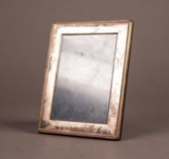 SILVER FRONTED DESK TOP PHOTO FRAME, with red wood back and easel support, 6 ½? x 5? (16.5cm x 12.