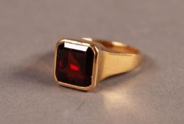 SIGNET RING, the rectangular top set with a square garnet, 8.2gms, ring size M/N