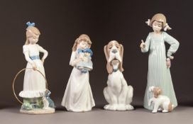 FOUR NAO PORCELAIN FIGURES, three modelled as young girls, one with a puppy at her feet, another