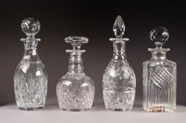 FOUR GLASS DECANTERS AND STOPPERS, including one wheel cut with flowers and a TYRONE square spirit