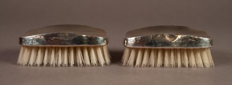 BOXED PAIR OF ENGINE TURNED FILLED SILVER BACKED MILITARY HAIR BRUSHES, Birmingham 1975