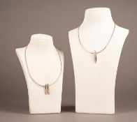 FIFTEEN VERY SIMILAR MODERN ITALIAN SILVER TWISTED WIRE NECKLACES, each suspending elliptical and