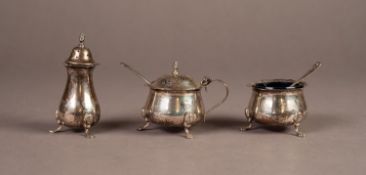 GEORGE V THREE PIECE SILVER CONDIMENT SET, of bellied form with cyma borders and scroll feet,