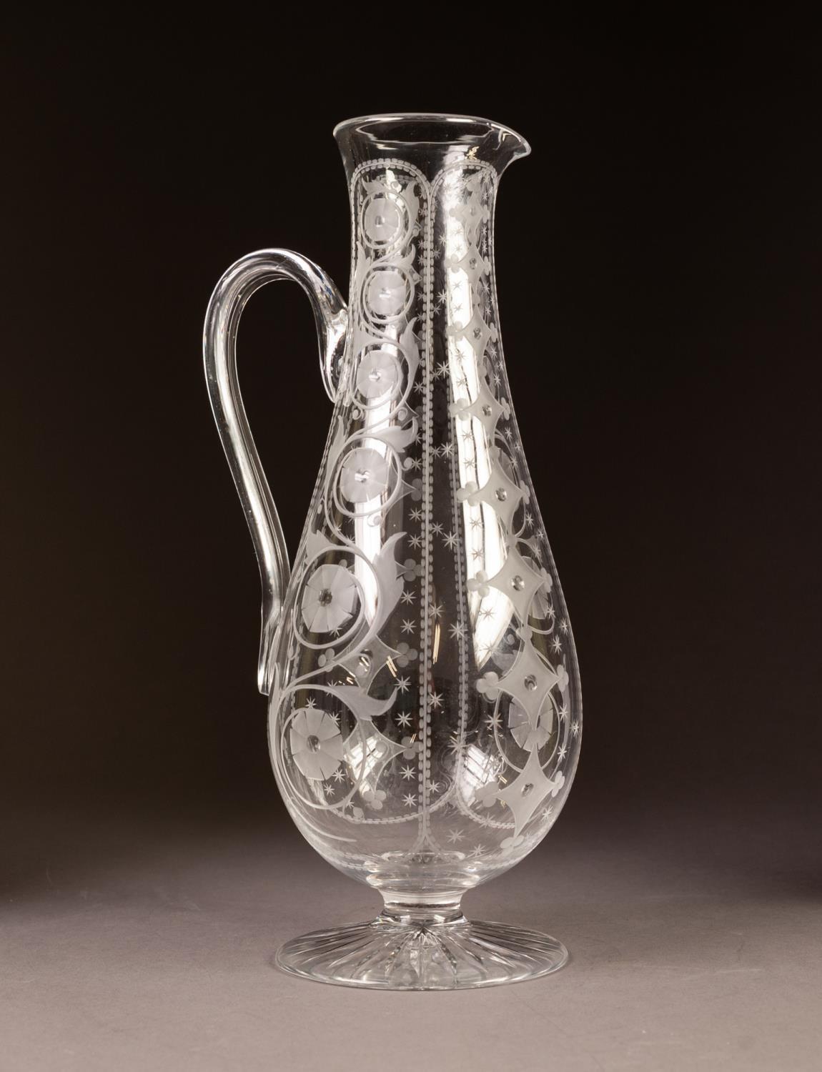 MODERN GLASS PEDESTAL EWER, of slender baluster form with scroll handle, wheel cut with vertical - Image 2 of 2