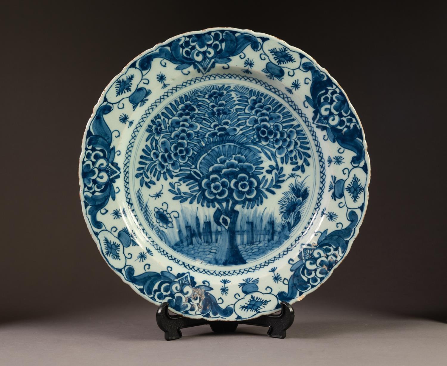 PROBABLY DUTCH, NINETEENTH CENTURY BLUE AND WHITE DELFT POTTERY WALL PLAQUE, of typical form,