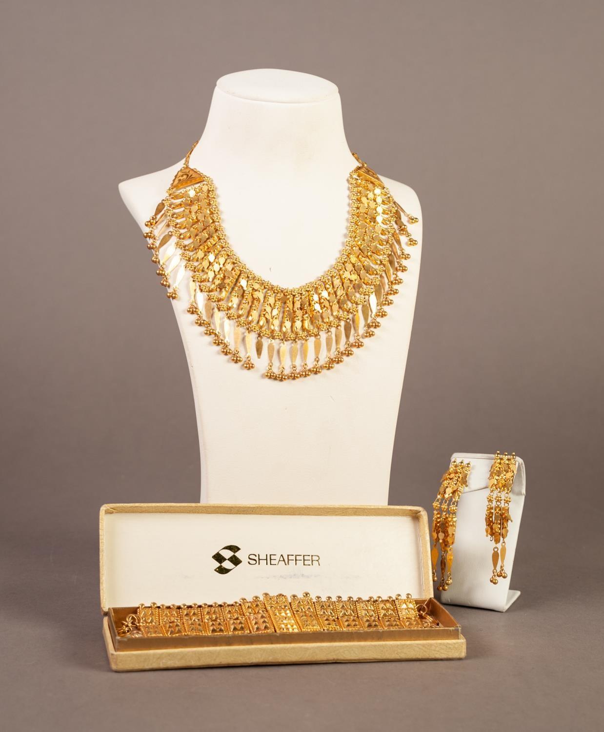 FRINGE NECKLACE AND A PAIR OF MATCHING THREE STRAND DROP EARRINGS, in cases labelled 'Senco