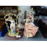 FOUR 'LEONARDO' RESIN FIGURES OF CRINOLINE LADIES AND A PAIR OF POTTERY SQUARE JUG/VASES WITH BIRD