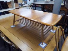 AN ERCOL LIGHT ELM OBLONG COFFEE TABLE, WITH RAILED UNDERSHELF