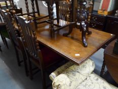 AN OAK REFECTORY STYLE DINING TABLE, OBLONG, ON END PANEL SUPPORTS WITH LINEN FOLD CARVING, 5?5? X