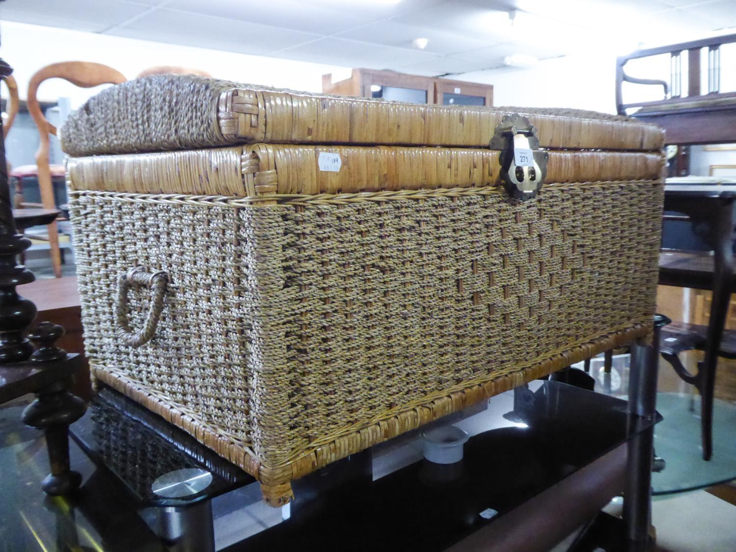 ORIENTAL WICKER TRUNK WITH METAL HASP AND A BRIGHT STEEL FRAMED WHAT-NOT WITH FOUR GLASS SQUARE