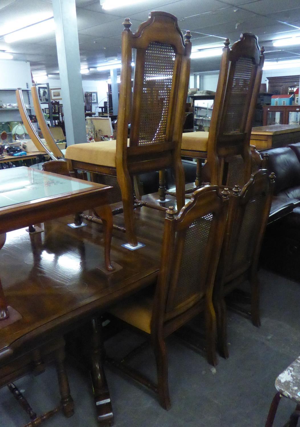 A CONTINENTAL WALNUT DINING ROOM SUITE OF NINE PIECES, TO INCLUDE; EXTENDING DINING TABLE WITH TWO - Image 2 of 2