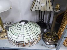 A METAL TIFFANY STYLE LAMP WITH LARGE LEADED AND STAINED OPAQUE GLASS DOMED SHAPED SHADE, 22" HIGH