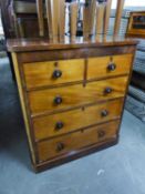 VICTORIAN FIGURED MAHOGANY CHEST OF TWO SHORT AND THREE LONG DRAWERS, WITH QUADRANT FORECORNERS,