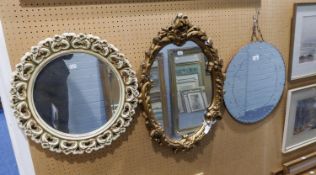 GILT FRAMED SHAPED MIRROR (A.F.), ANOTHER IN CREAM PLASTER FRAME AND A CIRCULAR FRAMELESS WALL