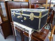 TWENTIETH CENTURY TRAVELLING TRUNK IN BLACK WITH BRASS FITTINGS