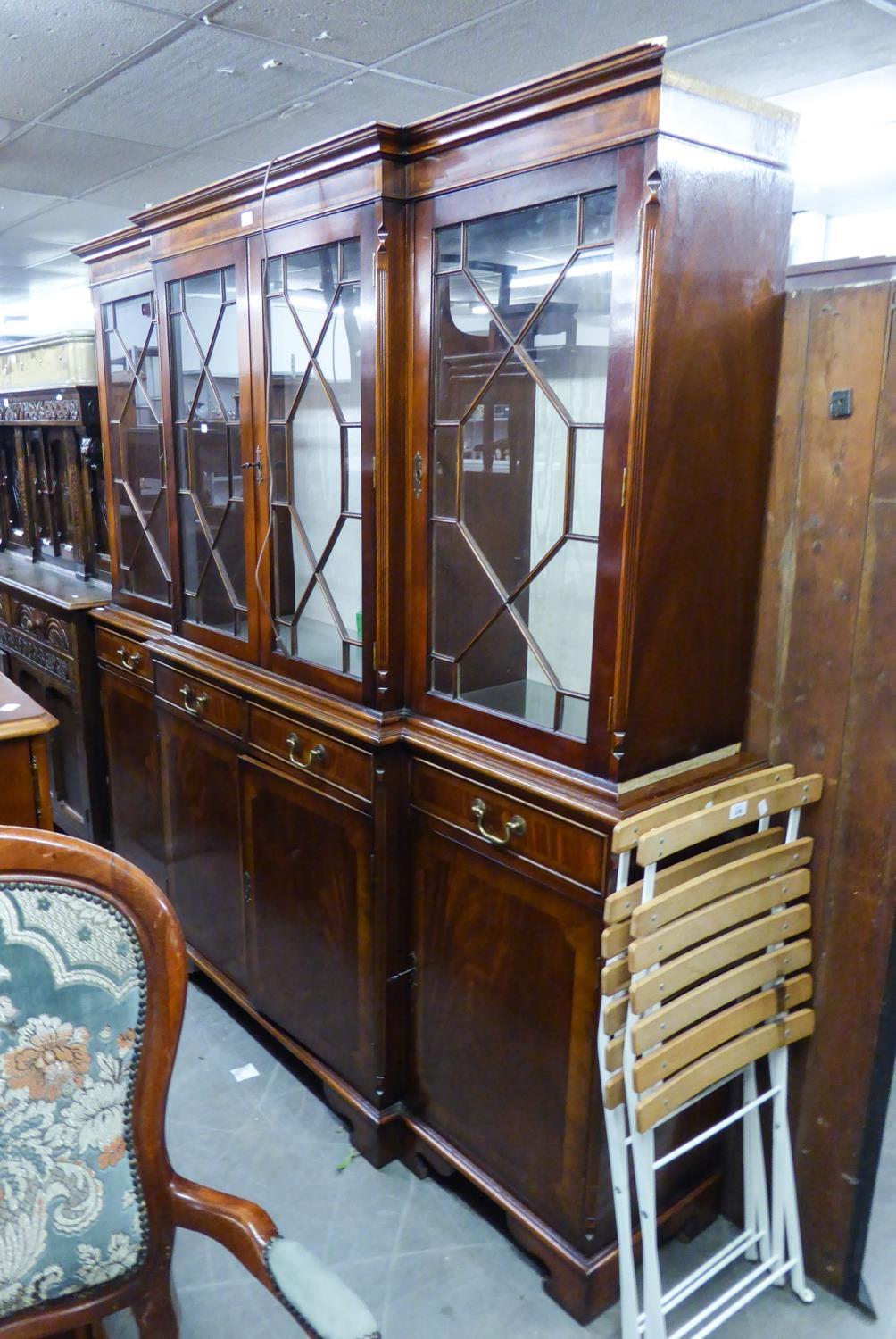 GEORGE III STYLE MAHOGANY BREAKFRONT LIBRARY BOOKCASE, IN TWO PARTS, THE SUPERSTRUCTURE ENCLOSED