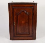 LATE EIGHTEENTH CENTURY OAK AND MAHOGANY CROSSBANDED FLAT FRONTED CORNER CUPBOARD, of typical form