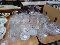 A LARGEE QUANTITY OF MOULDED GLASSWARES TO INCLUDE; CANDLESTICKS, TWO HANDLED VASES, BOWLS, CARPET