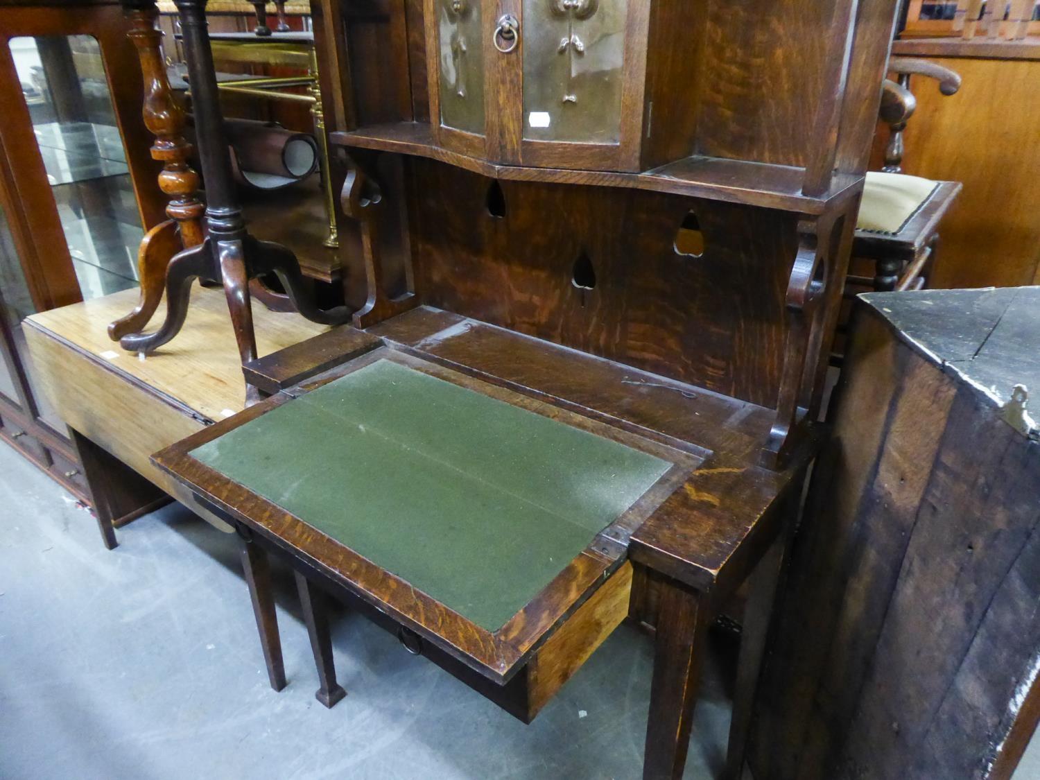 OAK ARTS AND CRAFTS BUREAU WITH FOLDING WRITING TOP, TWO COPPER EMBOSSED PANEL DOORS - Image 2 of 2