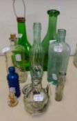 OLD GREEN GLASS CONICAL WINE FLASK WITH COAT OF ARMS, SMALL CLEAR GLASS TEAPOT SHAPED VESSEL AND