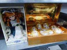 A BOXED COSTUME DOLL, A BOXED SET OF SIX JAPANESE PORCELAIN CUPS AND SAUCERS, A PAIR OF JAPANESE