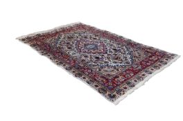 BOLD, MULTI-COLOURED GOREVAN, PERSIAN, CARPET, witht concentric lozenge shaped centre medallions, on