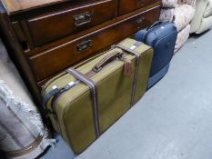 A MATCHING SET OF THREE SUITCASES AND ANOTHER SUITCASE (4)