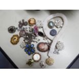 A SMALL COLLECTION OF COSTUME JEWELLERY, MAINLY DECORATIVE BROOCHES ETC.....