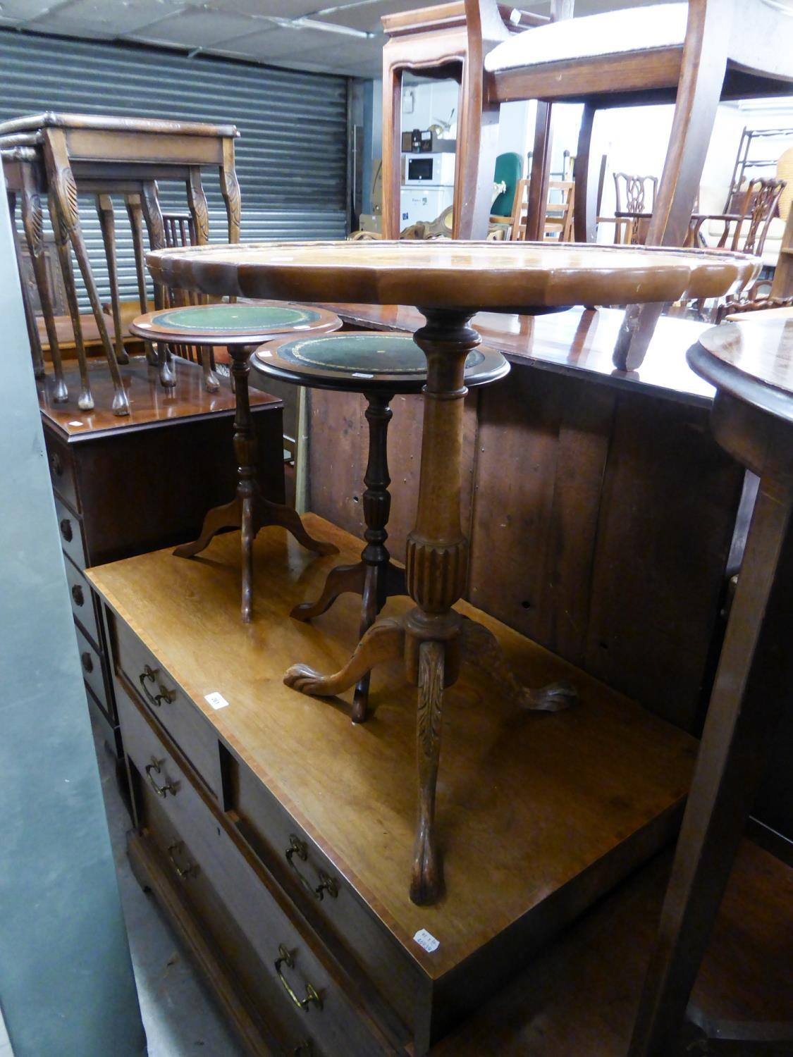 A REPRODUCTION TRIPOD TABE WITH PIE-CRUST TOP, ALSO TWO TRIPOD WINE TABLES AND A NEST OF THREE