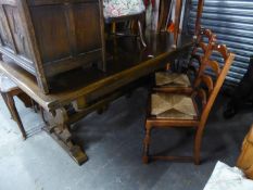A TWENTIETH CENTURY OAK DRAW-LEAF TRESTLE END DINING TABLE AND SIX DINING CHAIRS