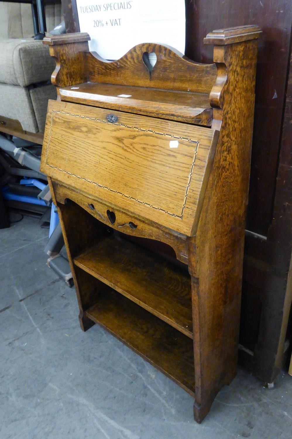 AN EDWARDIAN ARTS AND CRAFTS INLAID OAK BUREAU, WITH TWO OPEN SHELVES BELOW