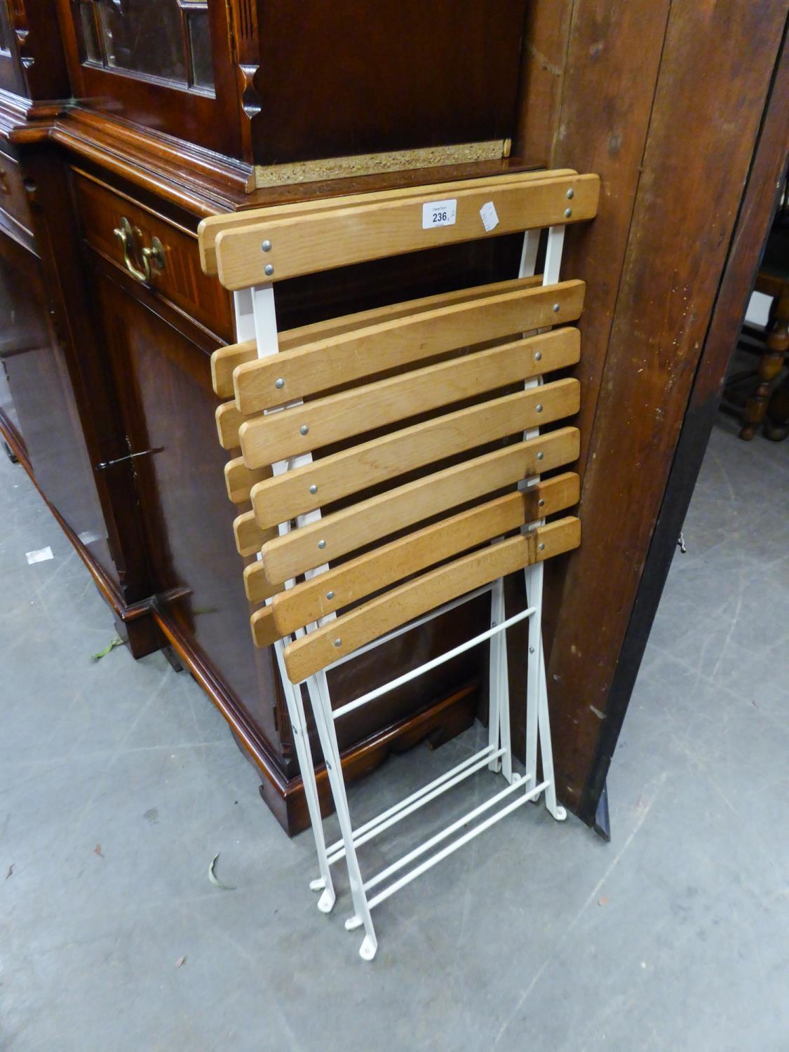 A PAIR OF WHITE WROUGHT IRON AND SLATTED WOOD FOLD FLAT CHAIRS (2)