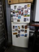 A SMALL 'FRIDGEMASTER' FRIDGE FREEZER