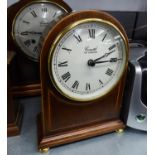 COMITTI, LONDON, BATTERY MANTEL CLOCK IN MAHOGANY MILESTONE SHAPED CASE, WITH WHITE ROMAN DIAL, ON