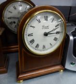 COMITTI, LONDON, BATTERY MANTEL CLOCK IN MAHOGANY MILESTONE SHAPED CASE, WITH WHITE ROMAN DIAL, ON