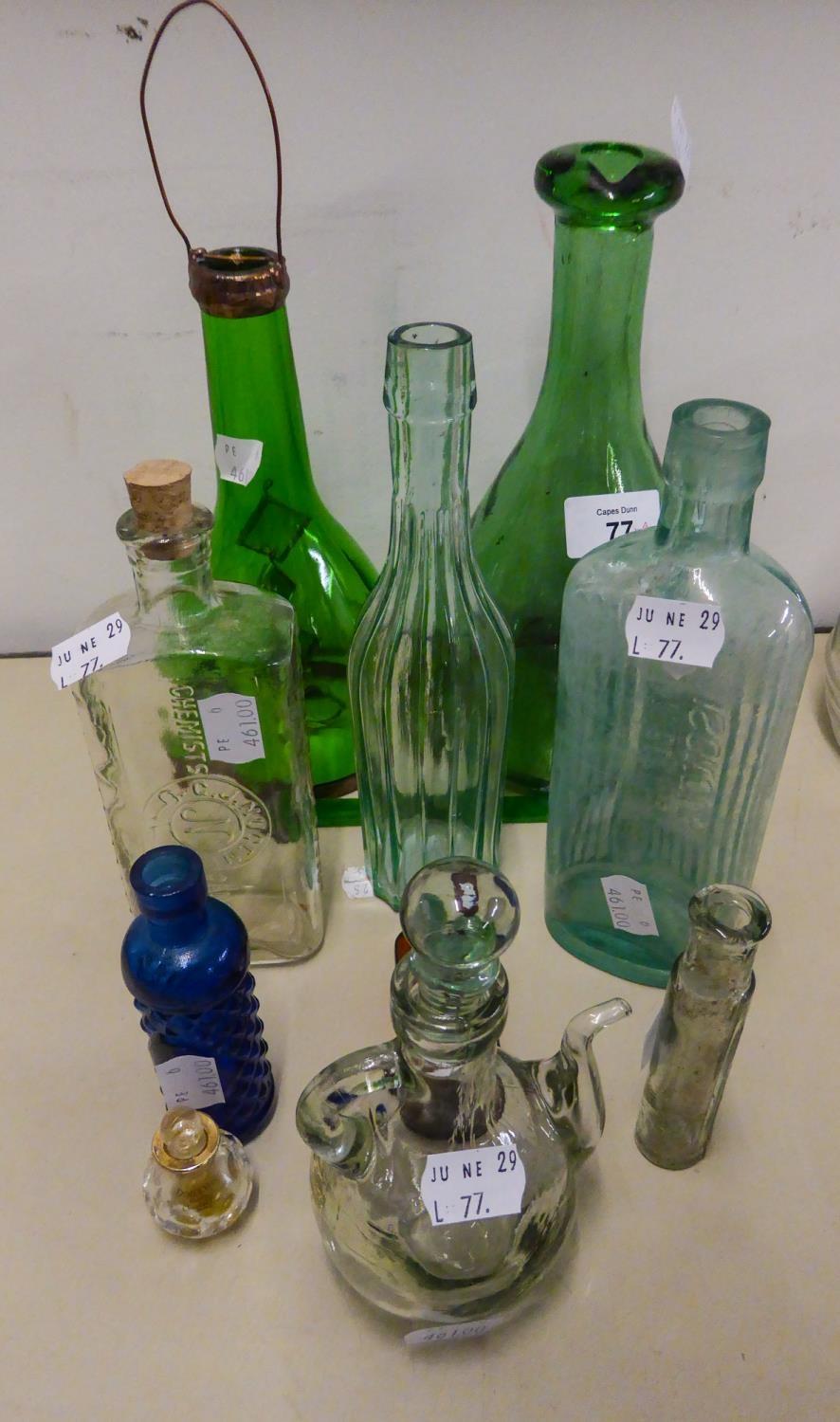 OLD GREEN GLASS CONICAL WINE FLASK WITH COAT OF ARMS, SMALL CLEAR GLASS TEAPOT SHAPED VESSEL AND - Image 2 of 2