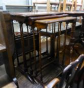 A NEST OF THREE MAHOGANY OBLONG COFFEE TABLES WITH SLENDER SPINDLE LEGS AND CHEVAL FEET (AS FOUND)